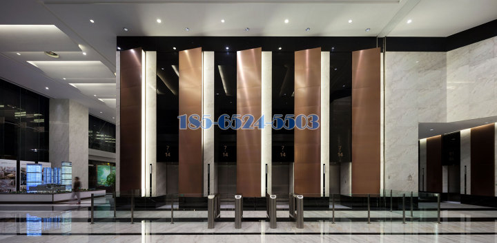 一楼大厅电梯间古铜色铝蜂窝板